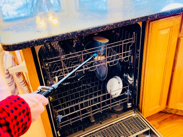 And don't forget to use it on your dishwasher. You can spray the outside of the dishwasher with a disinfectant spray, but you can also open it up and spray the inside, hitting all of those areas that sometimes collect those nasty smells.