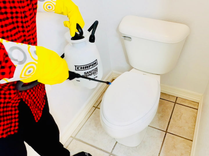 I can stand back at a distance, spray the whole thing down from top to bottom, get all the way around the bottom and the base, those hard to reach areas around your toilet, and then, in addition to that, I also spray the entire tile surface around it, disinfecting the floor as well.