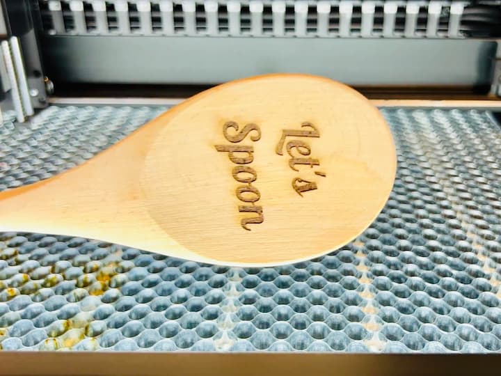 I started by placing my wooden spoon into the xTool S1.  I mapped it, and centered my design, and ran the laser tool.