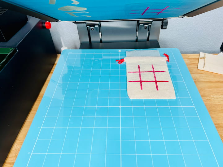 I opened up the screen printer to reveal my design.  