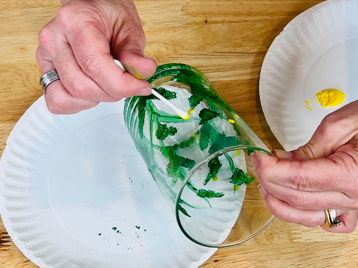 overhead shot showing step in flower craft vase painting of 