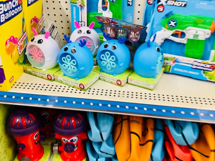 water sprinklers and pool games for kids from the dollar store