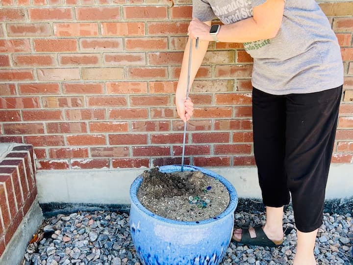 For my large flower pot, I put a shepherd's hook in it.