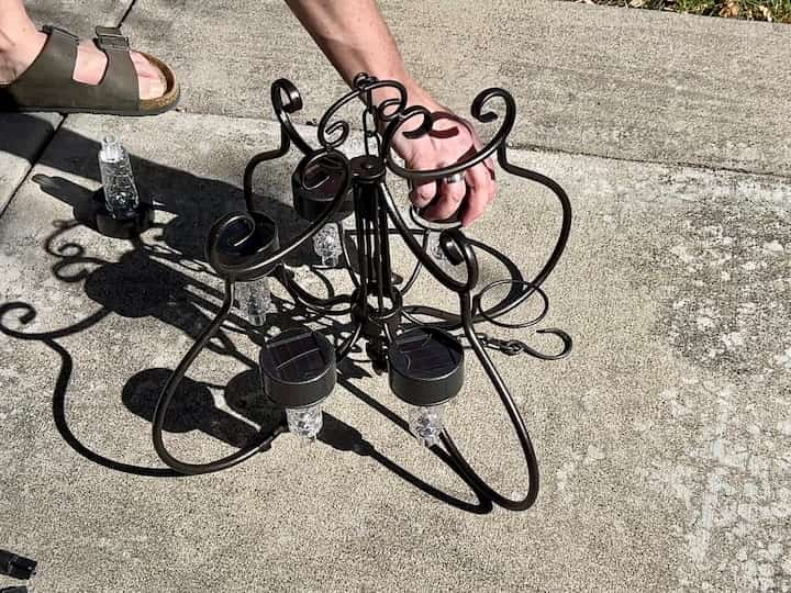 I pulled the bases off of six solar lights and then I added them to the holes. 