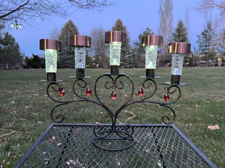 solar candle holder glowing at night