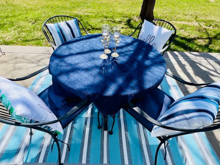 summer dining table on patio with table decor