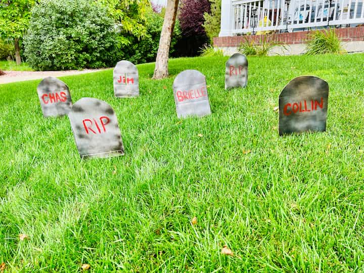 I placed the tombstones in my yard to create a little graveyard. And I'll be using a solar spotlight to help me light these up in the evenings.