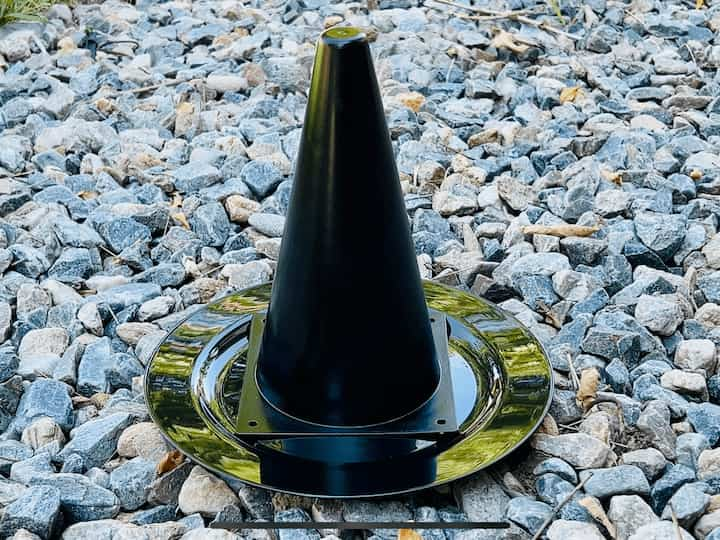 And I let that dry completely. I took the plate and placed it on the ground. Then I placed the cone on top and now I have a super cute witch's hat. 