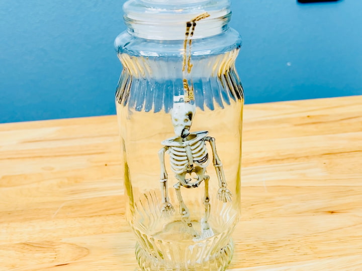  I have this creepy skeleton hanging out in a jar.