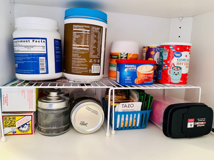 corner cabinet with shelves and pantry items