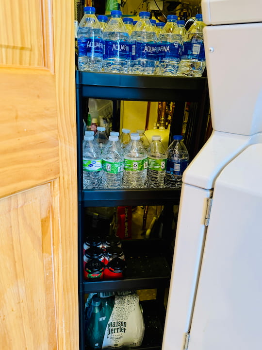 extra pantry storage shelf in laundry closet