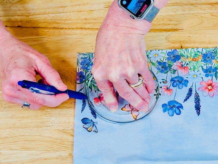 tracing coaster on napkin