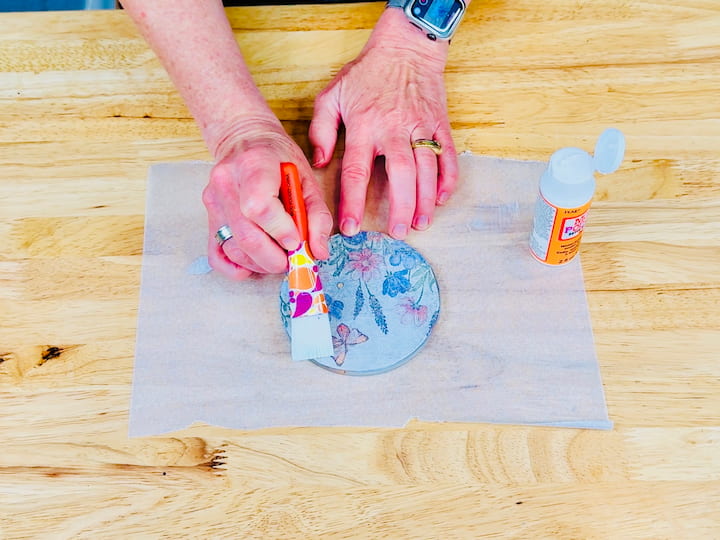 seal the napkin with another coat of mod podge