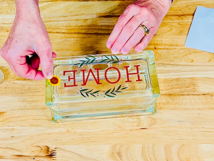 adding stickers to the glass block