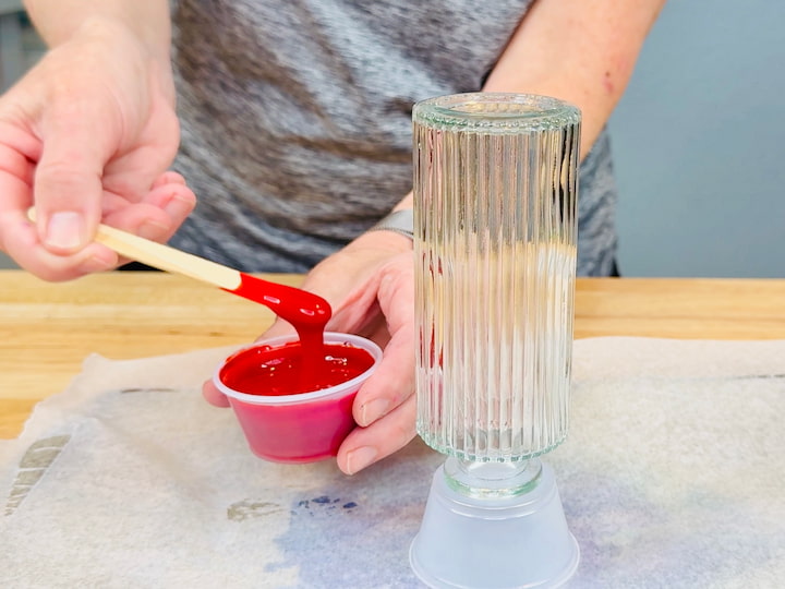 mixing the glue and food color together