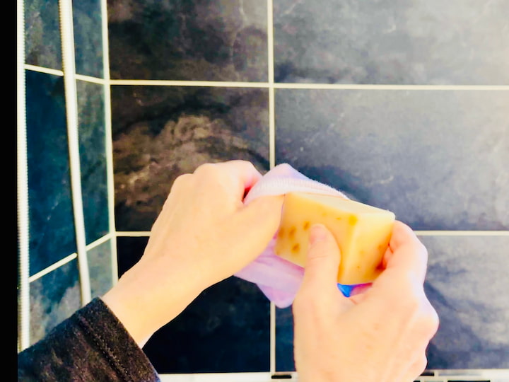 Chas placing soap in a sock
