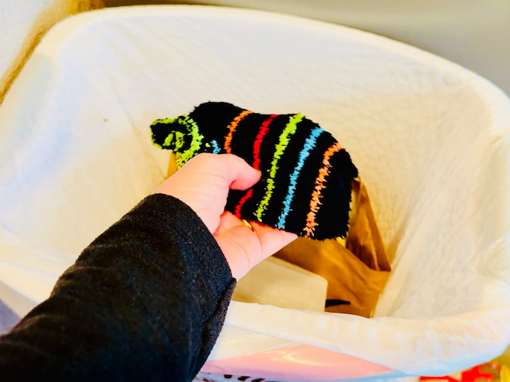 Sock over a trashcan