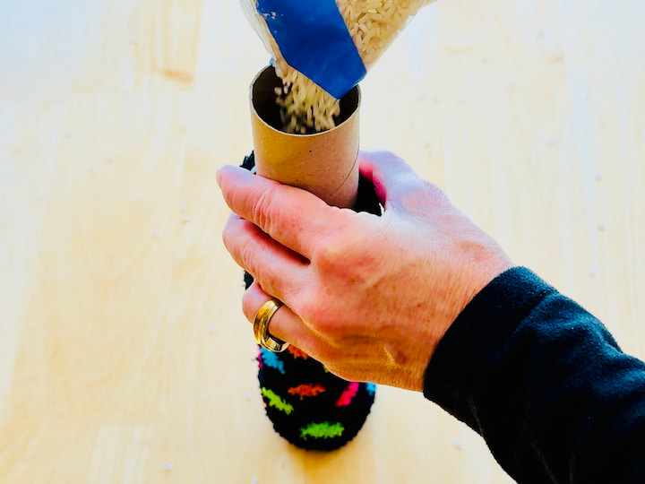 Adding rice to a sock