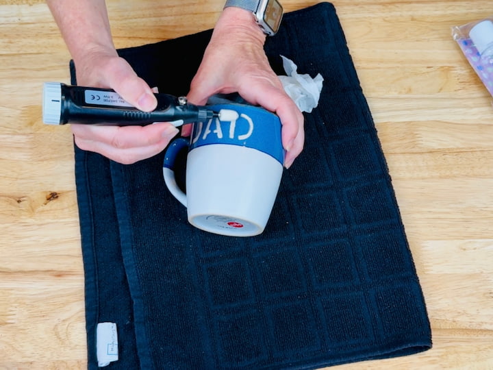 buffing the ceramic mug