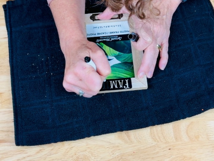 Adding stencil and dry erasing stencil onto the top of the picture frame