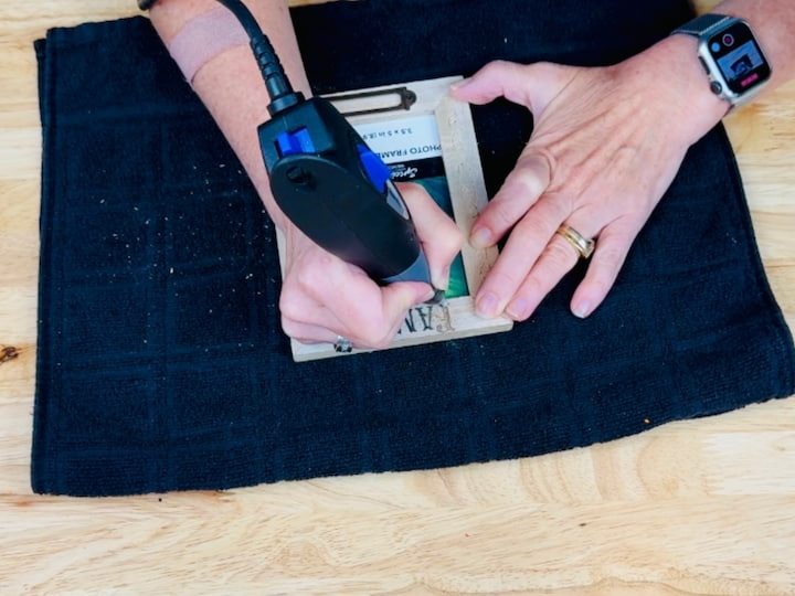 engraving the wooden frame