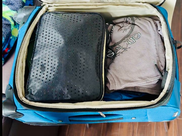 ✅ Pro Tip: Keep one suitcase accessible for hotels with shared clothes, toiletries, and pet essentials.