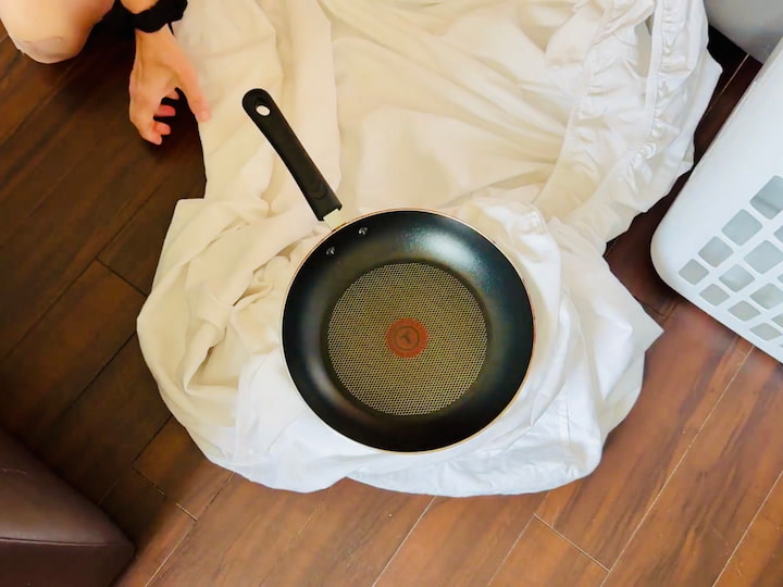 Pots & Pans: Wrapped in old sheets (previously used as protective furniture covers)

