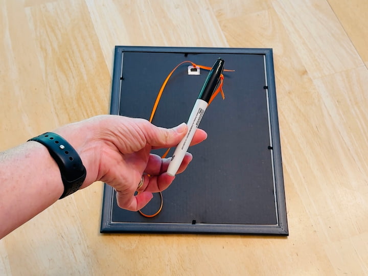 add ribbon and dry erase marker