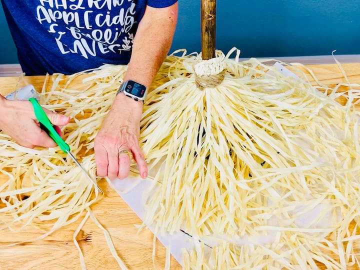 cutting off excess hula skirt