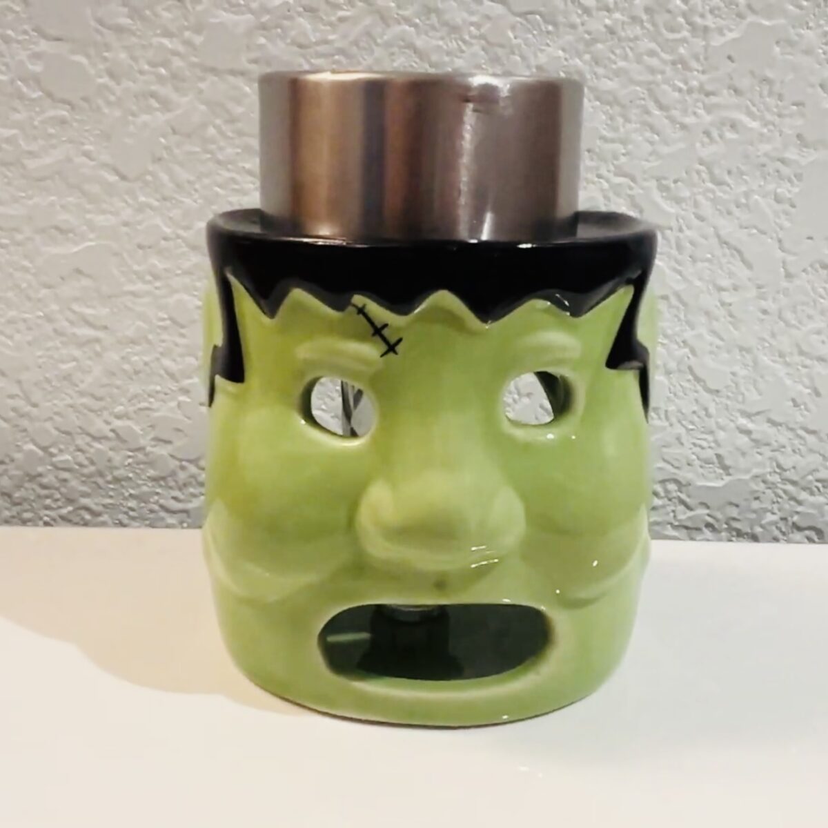 Frankenstein candle with solar light in it