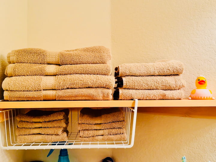 Folded towels on shelf