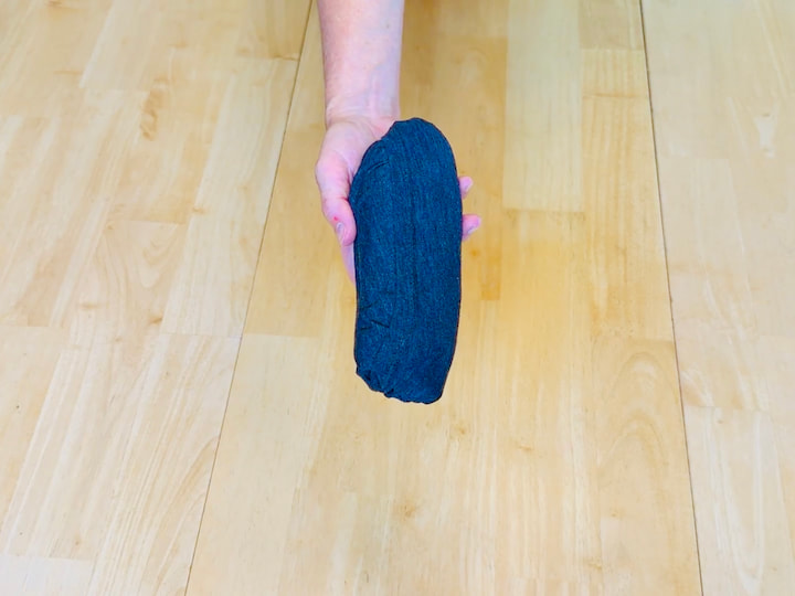 tuck the roll into the fold for the military roll