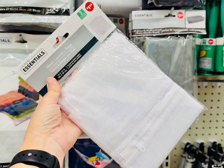 Mesh laundry bags help separate clothes while keeping your suitcase organized.