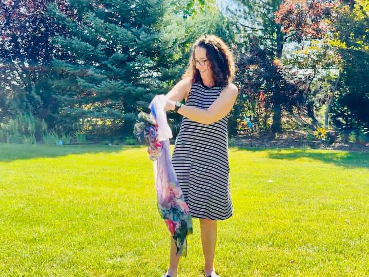 Using scarf as a towel to dry off