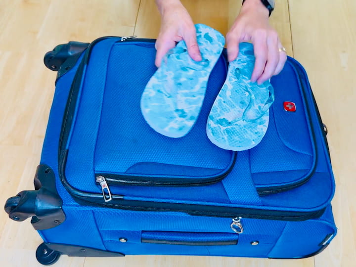 Pack snacks and flip-flops in exterior pockets for easy access. Keep small items like hair ties, drink packets, or gum in zip compartments.