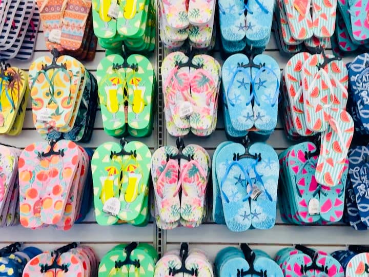 Dollar Tree has soft neck pillows and microfiber blankets for around $5. I always bring a cozy pair of flip-flops too — great for hotels, flights, or poolside.