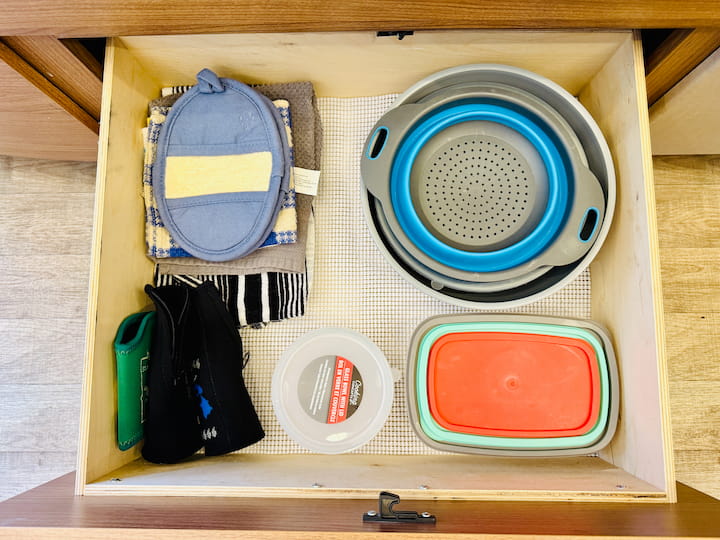 Stacking Bowls/Storage: Dollar Tree sells wonderful stackable storage containers with lids that nest on top of each other. We use these for leftovers and prep.
Nesting Bowls: Our stacking bowls also came with lids and nest just as easily.
Collapsible Items: Look for things that collapse flat! Our strainer is a collapsible lifesaver, and you can often find similar items at Dollar Tree.
Microwave-Safe Glass: We utilize Dollar Tree glass bowls which are perfect for use in the microwave and fit snugly.