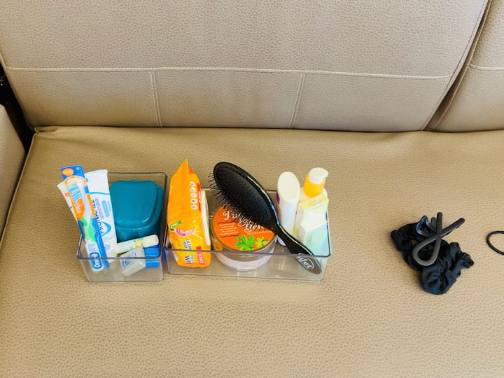 Clear container to keep things together in the medicine cabinet